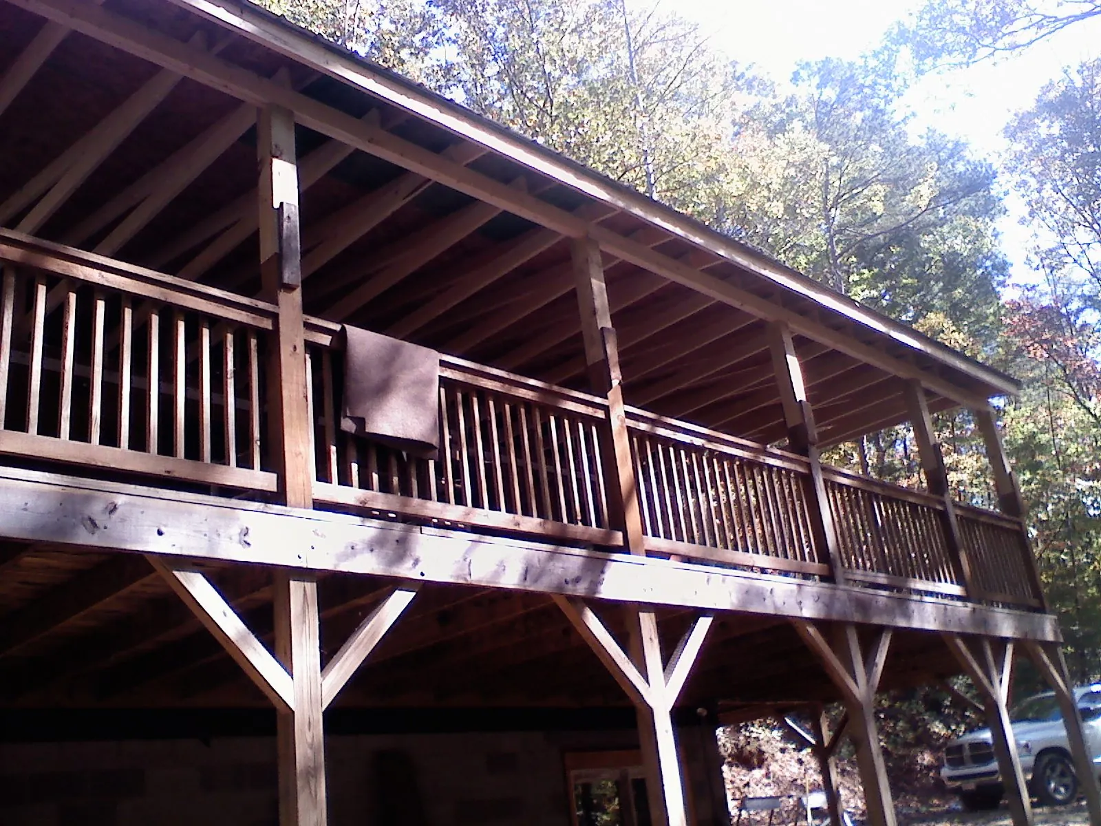 Timber framing under a new elevated porch and deck — Roof Leak Repair in Holton by Roofing Brothers